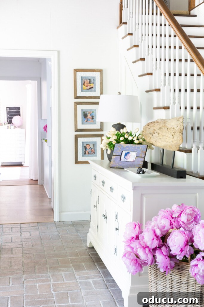 DIY picture frames for family photo wall ideas, showcasing how an inexpensive thrift store frame can become a chic decorative piece with a little DIY magic, perfect for conscious decorators.
