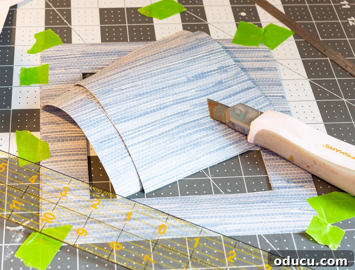 Instructions on how to cut wallpaper to use as a DIY picture frame mat, emphasizing precision and measurement.