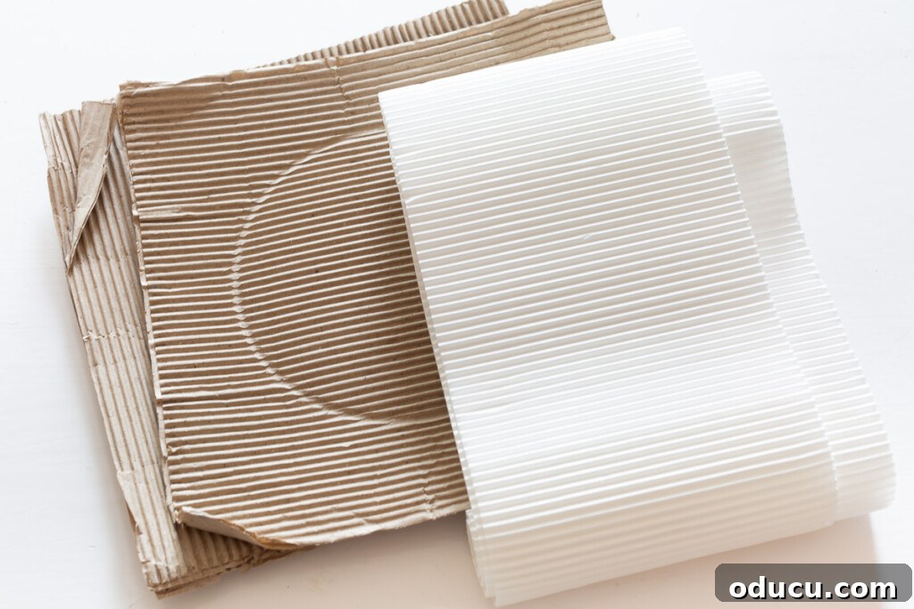 Scraps of corrugated cardboard, saved from packaging, ready to be repurposed for crafts and add a unique texture to the frames.