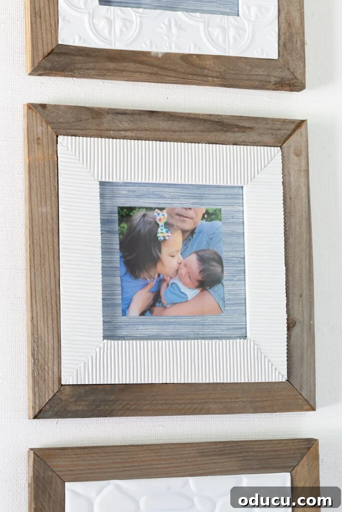 Close up of old picture frame makeovers using scrap wood and corrugated cardboard, highlighting the unique textures achieved through upcycling.