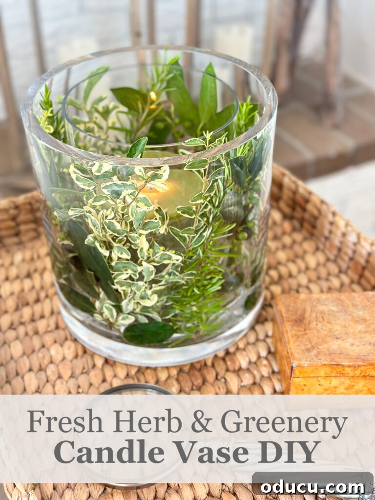 Effortless Greenery Candle Vases 10 A beautifully crafted fresh herb and greenery DIY candle vase, set on a wicker tray table in a cozy living room, perfect for summer decor.