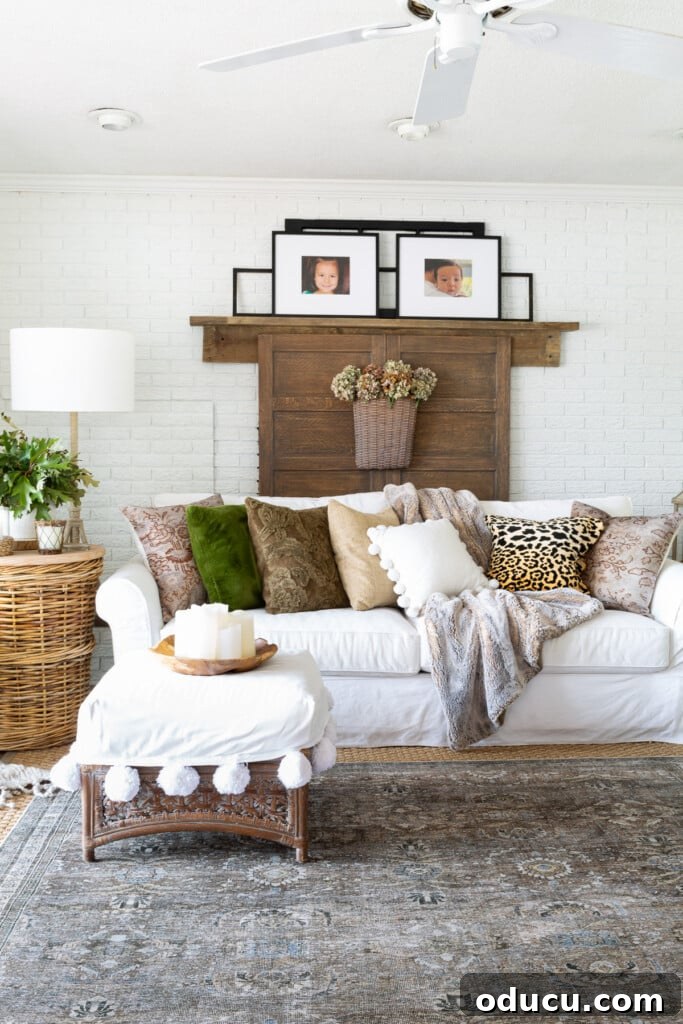 Creating a Cozy Fall Living Room Sanctuary 9 Decorated living room for fall using soft colors with an accent of green.