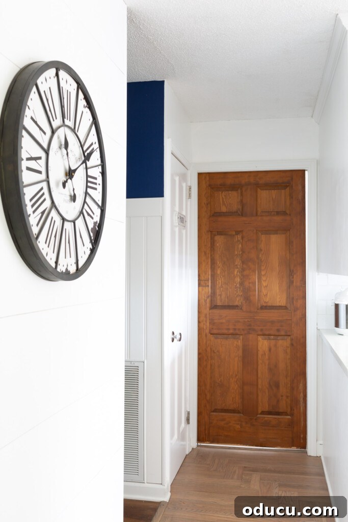 Modern Kitchen Renovation Butler Pantry and Hidden Murphy Door 5 Closed pocket door in hallway.