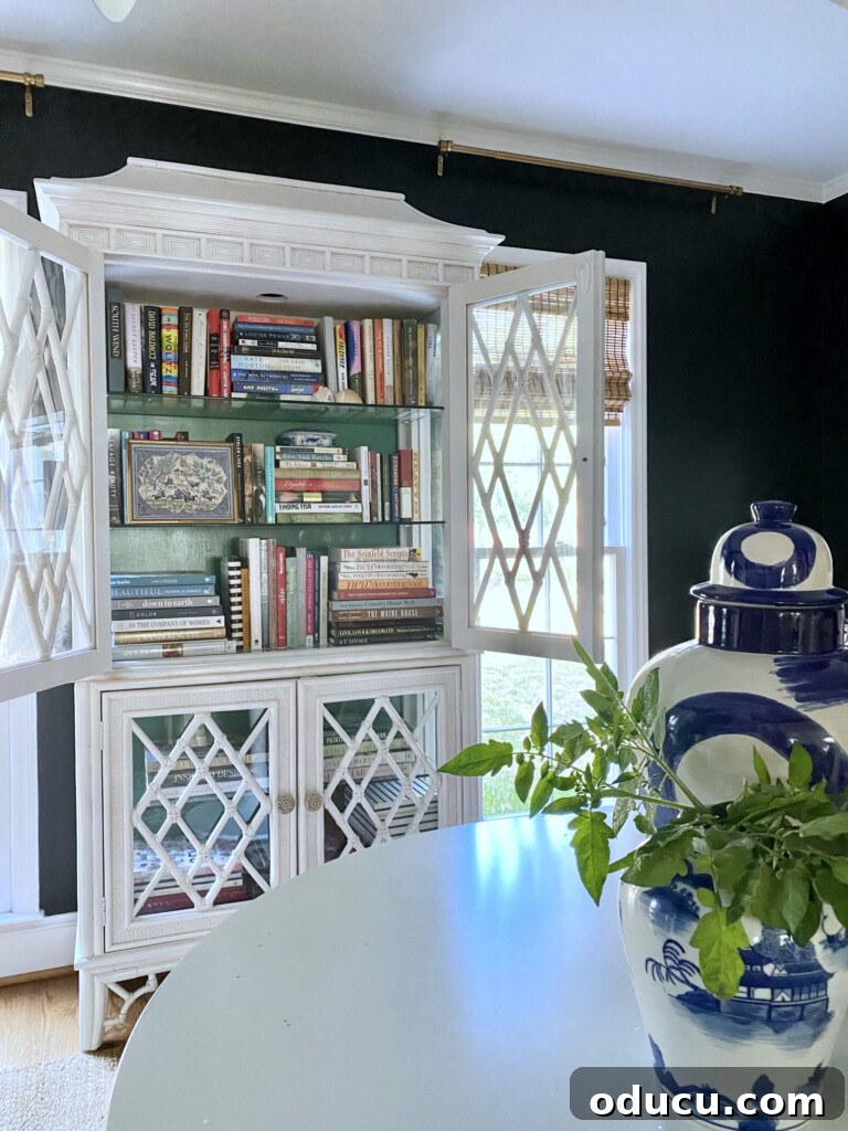 Discover Your Signature Decor Style 6 books styled in a china cabinet