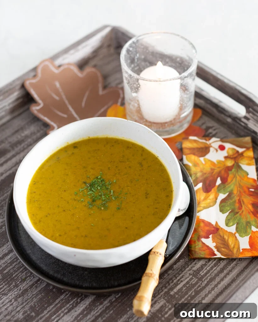 Secretly Delicious: The Healthy Vegetable Soup You Won't Believe 2 The Ultimate Creamy Vegan Vegetable Soup on a serving tray, garnished with fresh herbs.