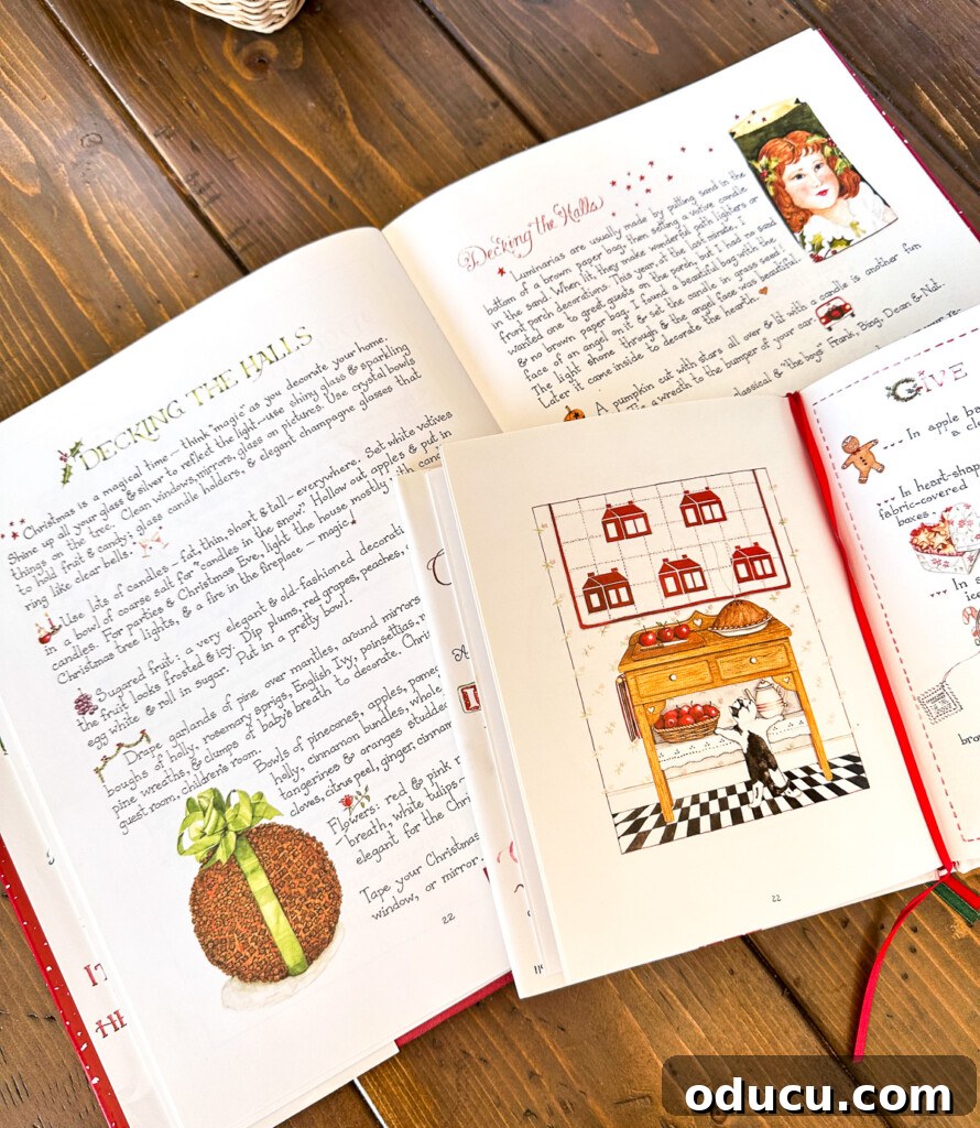 Unwrap the Magic: Best Christmas Decorating Reads 5 Susan Branch's illustrated Christmas books opened up on a table.