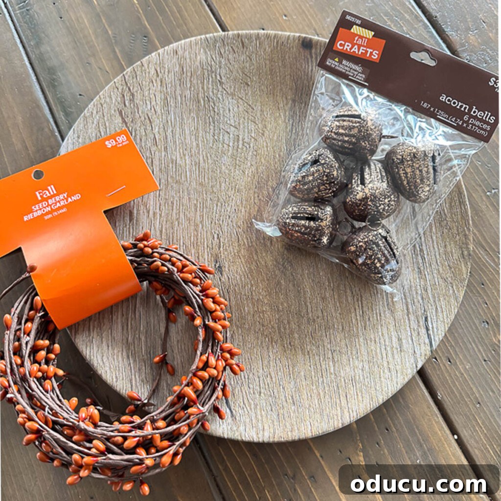 Simple & Stunning Thanksgiving Table Settings 4 Hobby Lobby Fall finds featuring wood look melamine dinner plates, berry ribbon garland, and acorn jingle bells