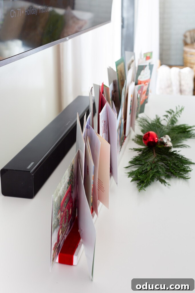 Showcase Your Holiday Cards: DIY Mantel & Table Display 12 Side view of the completed DIY Christmas card holder, showcasing card placement.