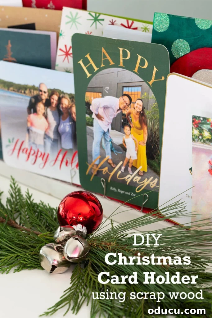 Showcase Your Holiday Cards: DIY Mantel & Table Display 16 Close-up photo of various Christmas cards displayed on the DIY holder. Text overlay reads: DIY Christmas Card Holder using scrap wood.