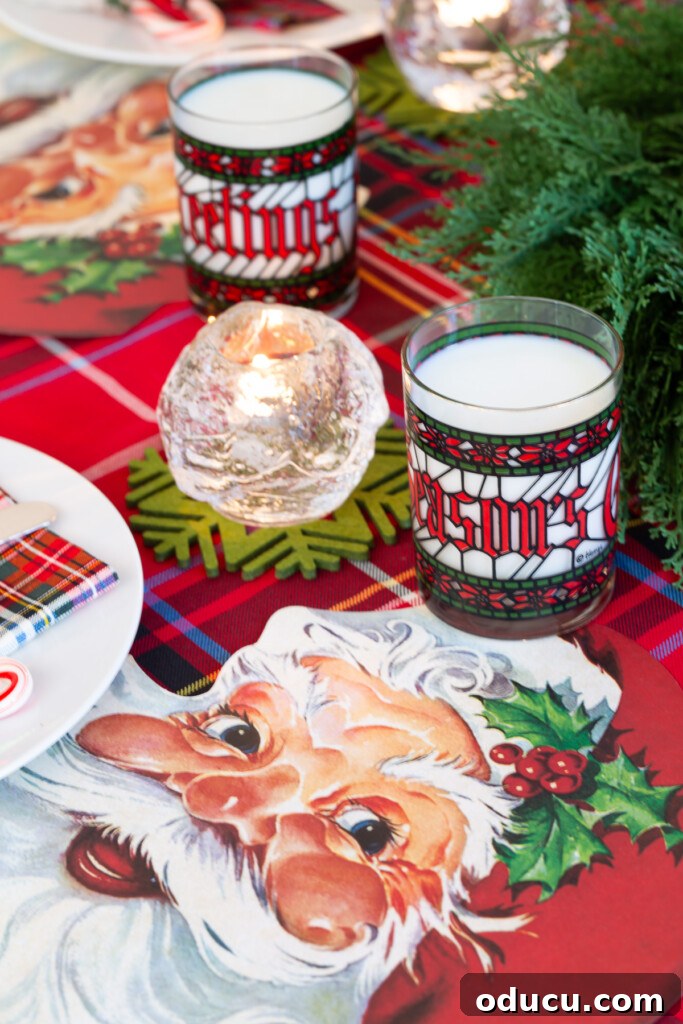 Joyful and Merry Christmas Dinner Table 11 Inspiring Christmas table setting ideas for kids, featuring Santa face placemats and festive elements that create a joyful dining experience.