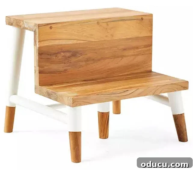 The Unsung Hero Your Home's Must-Have Small Furniture 3 Serena & Lily teak wood step stool with white accents.