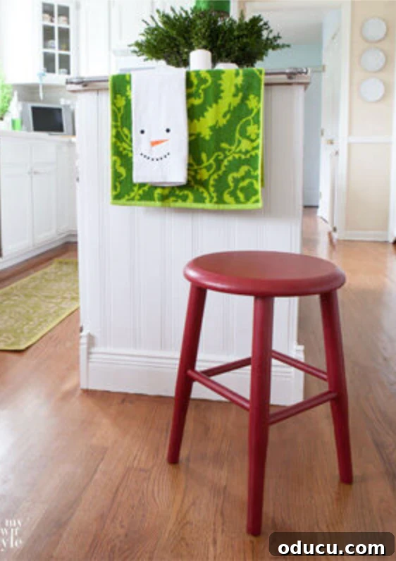 The Unsung Hero Your Home's Must-Have Small Furniture 8 wood stool in kitchen painted red.