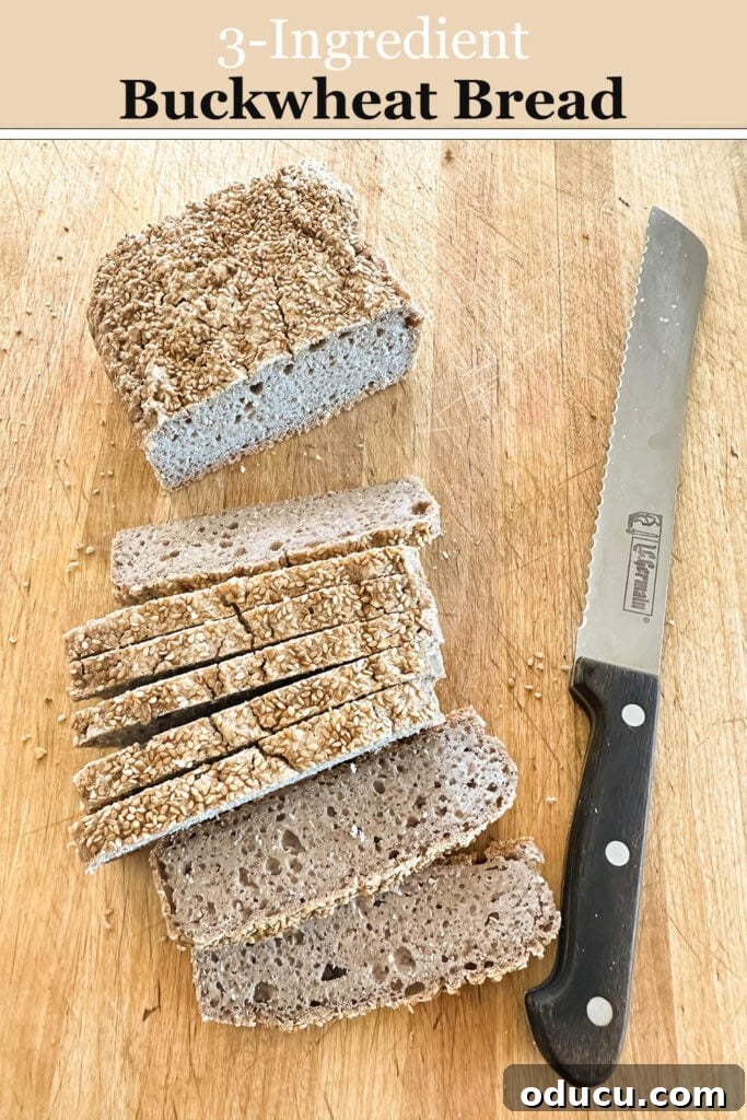 Buckwheat Toast Your Deliciously Wholesome Go To Snack 10 A freshly baked, golden 3-ingredient buckwheat bread loaf on a wooden cutting board, ready to be sliced.