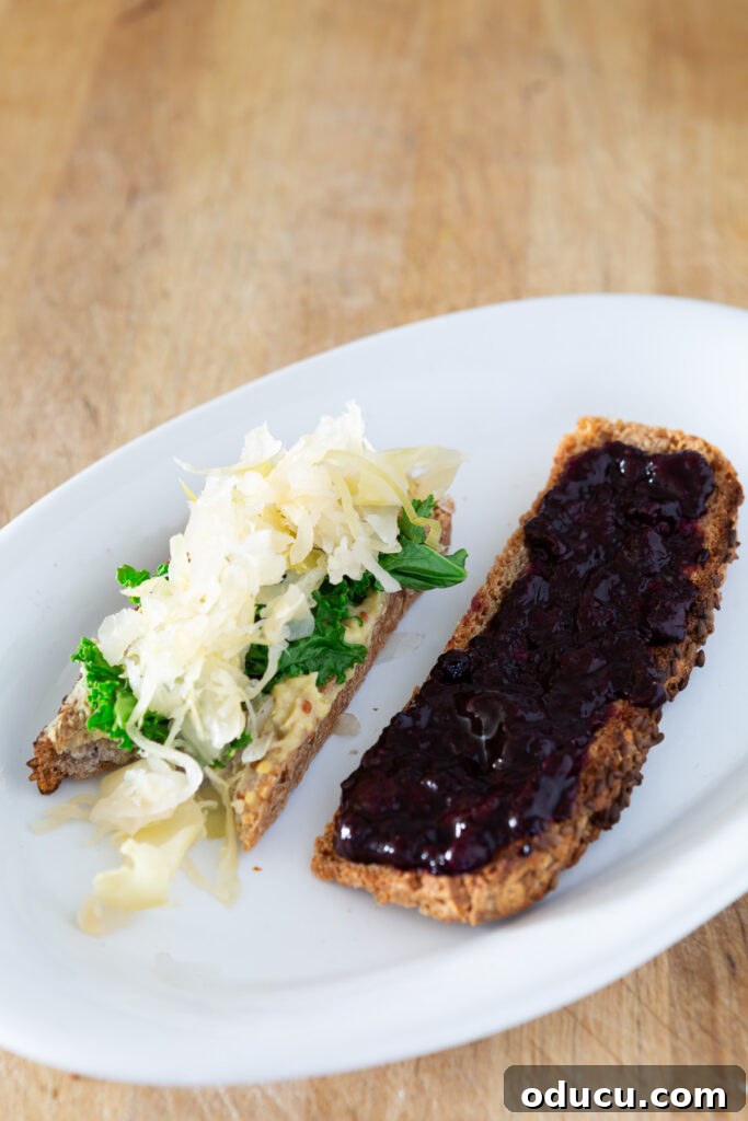 Buckwheat Toast Your Deliciously Wholesome Go To Snack 8 Two slices of buckwheat toast, one topped with a savory spread and the other with a sweet jam, showcasing versatile snack options.