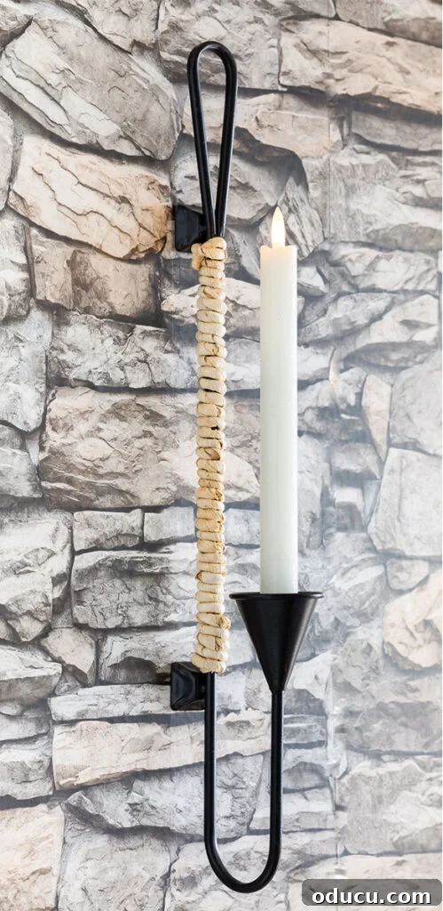 Decorate Wisely Reap the Rewards 8 Black Metal candle sconce from hobby Lobby