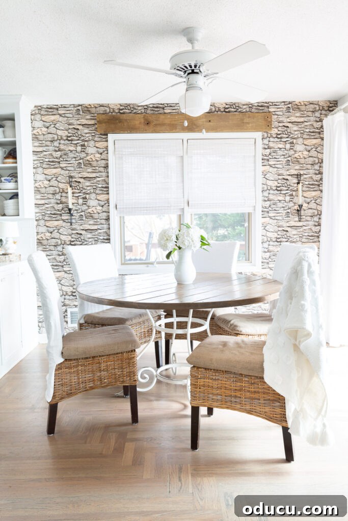 Decorate Wisely Reap the Rewards 10 neutral color scheme kitchen with new taper candle sconces on wall.