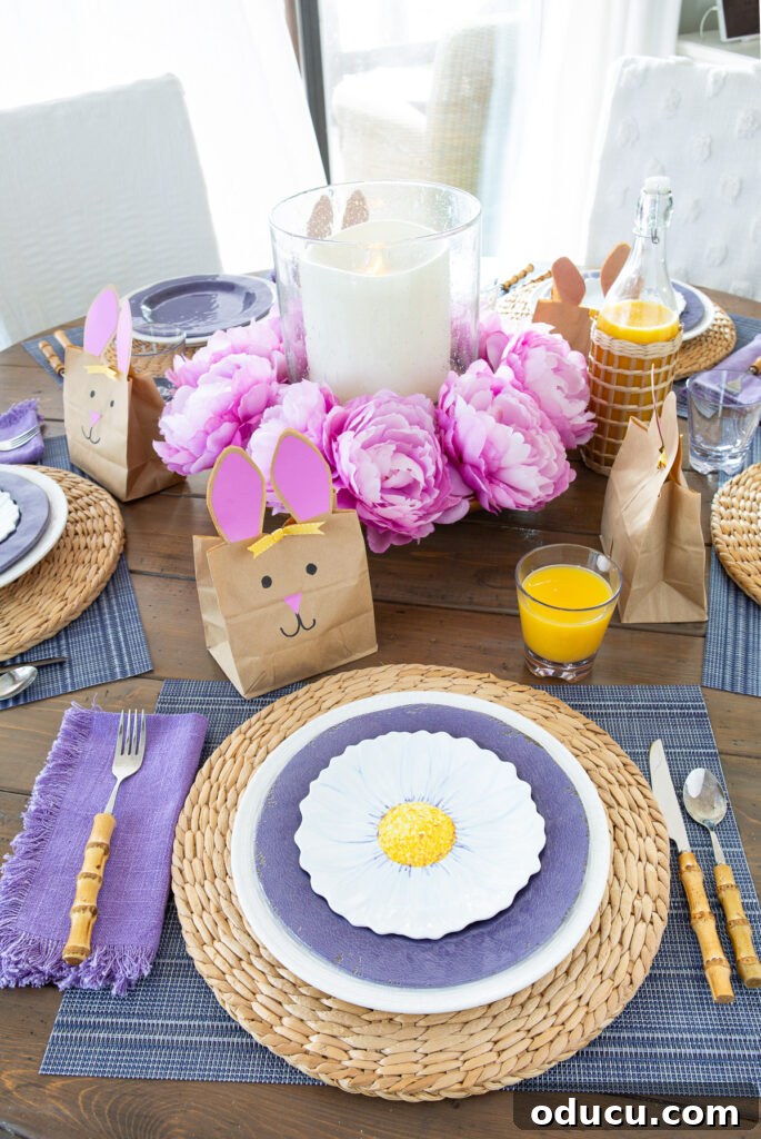 Effortless Easter Table Decor and Centerpiece Ideas 5 Easter table set for brunch, featuring layered plates, themed napkins, and charming individual goodie bags.