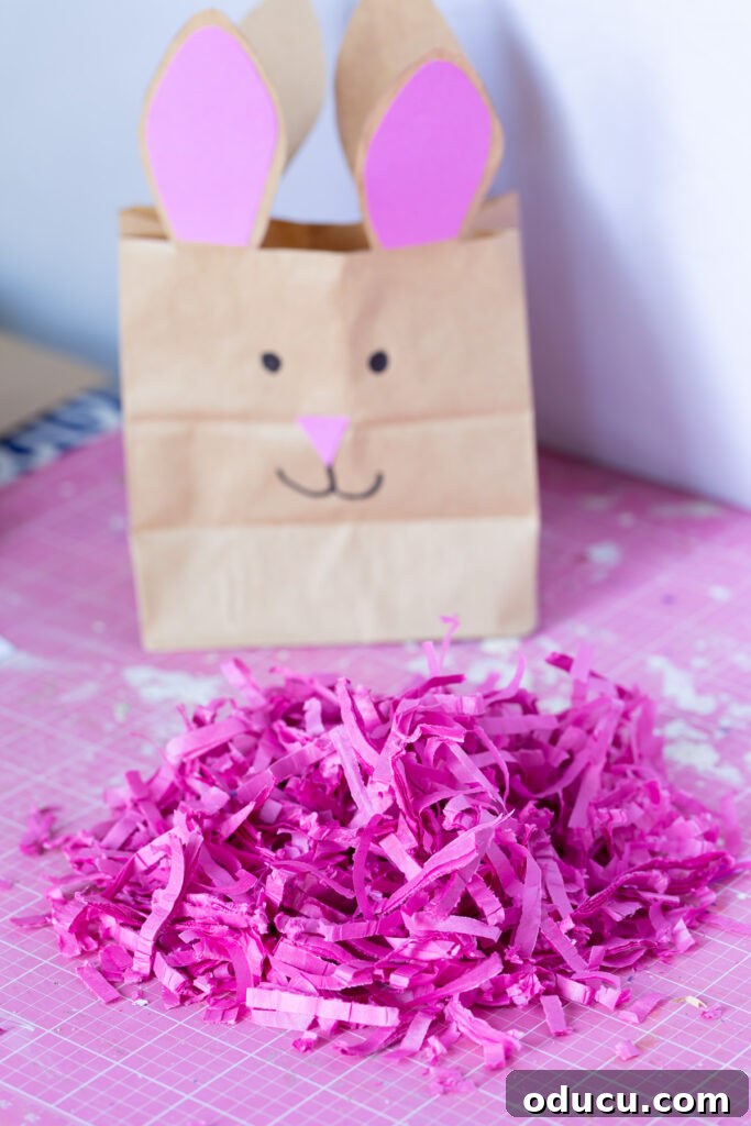 Craft Adorable Easter Bunny Gift Bags 12 Make Easter grass by shredding tissue paper in an office shredder.