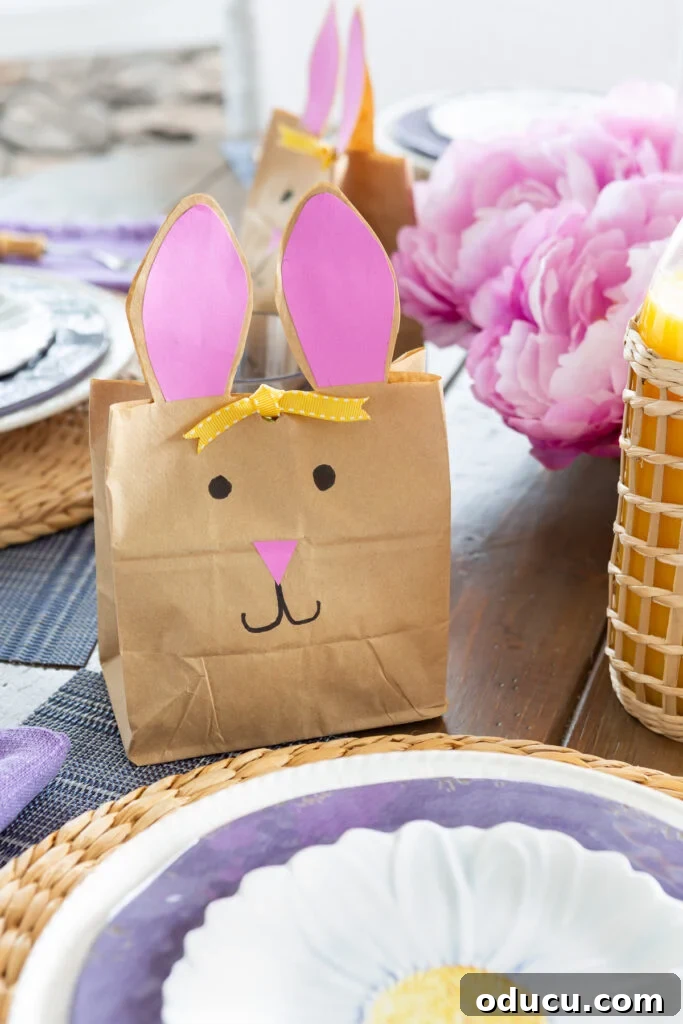 Craft Adorable Easter Bunny Gift Bags 3 Easter bunny bags for Easter placed at each table setting on an Easter dining table set up for Easter brunch.