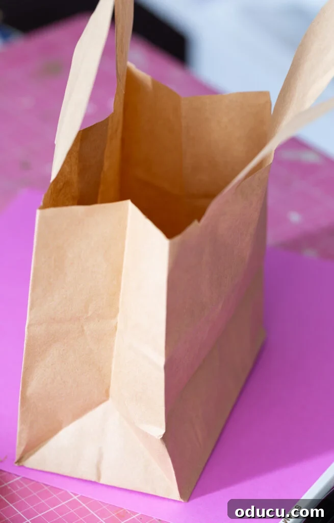 Craft Adorable Easter Bunny Gift Bags 8 Cut excess paper from sides of brown lunch bag.