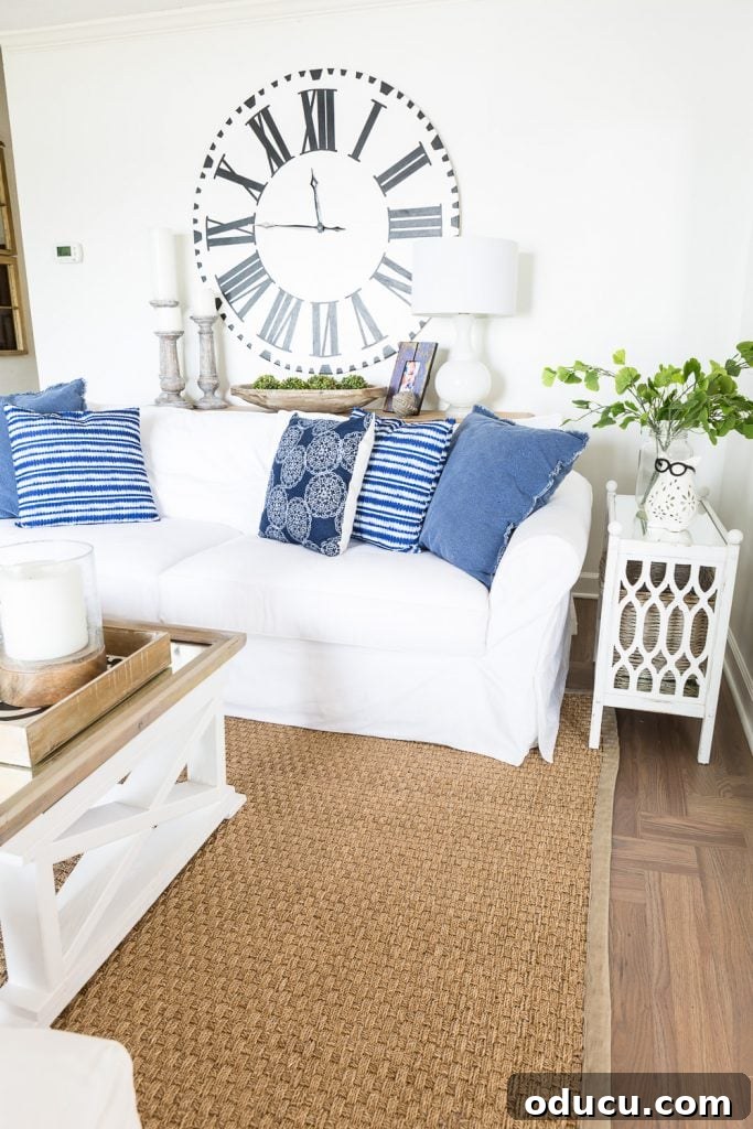 Elevating My Living Room with Area Rugs 3 Before and after image of a seagrass rug border painted beige, showcasing a living room refresh.