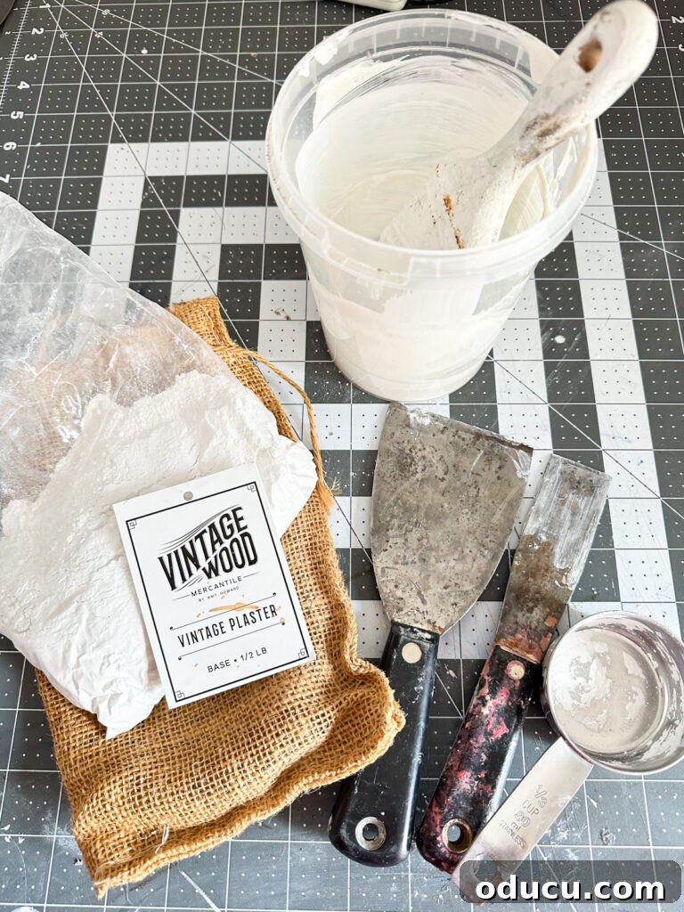 Unconventional Furniture Finishes Beyond Paint or Stain 11 Vintage Wood in a burlap bag with paint tools on worktable.