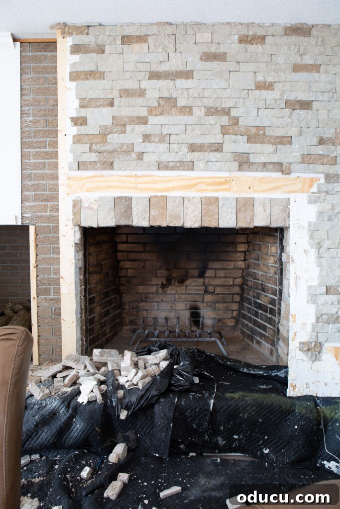 The Ever-Evolving Hearth 9 Stone surround around fireplace being removed