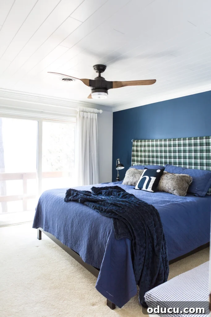 Chic Comfort for Guest Room One 2 Bedroom popcorn ceiling after getting WoodHaven Plank installed over it. A clever way to cover an ugly popcorn ceiling, showing before and after makeover results, ideal for bedroom renovations.