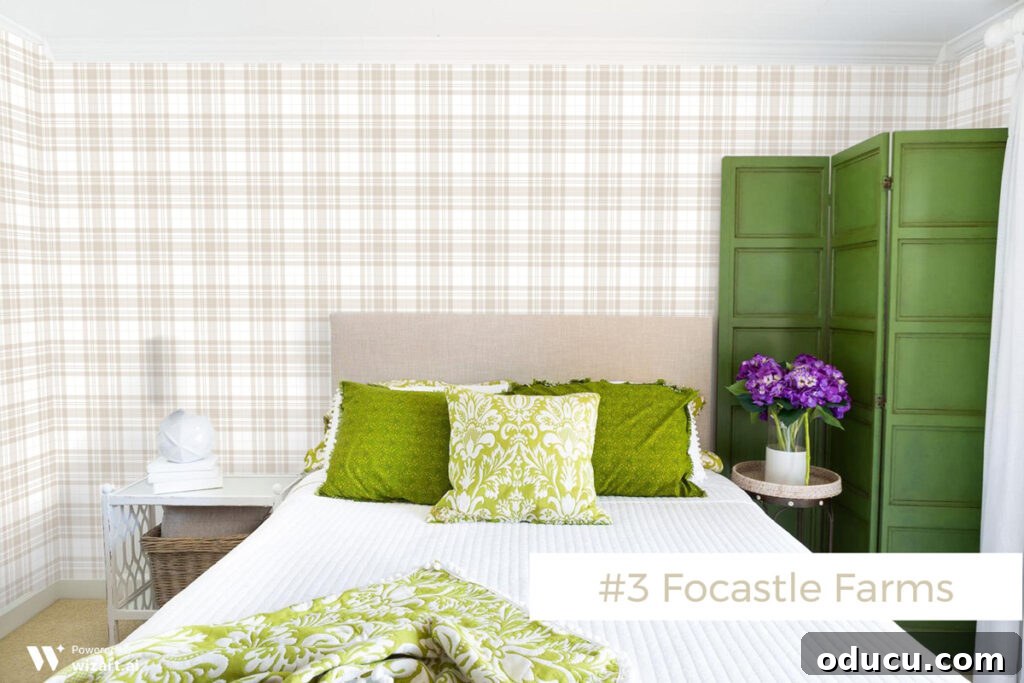 Chic Comfort for Guest Room One 11 #3 Focastle Farms wallpaper sample on wall. A neutral patterned wallpaper sample named Focastle Farms, applied on a wall for evaluation.