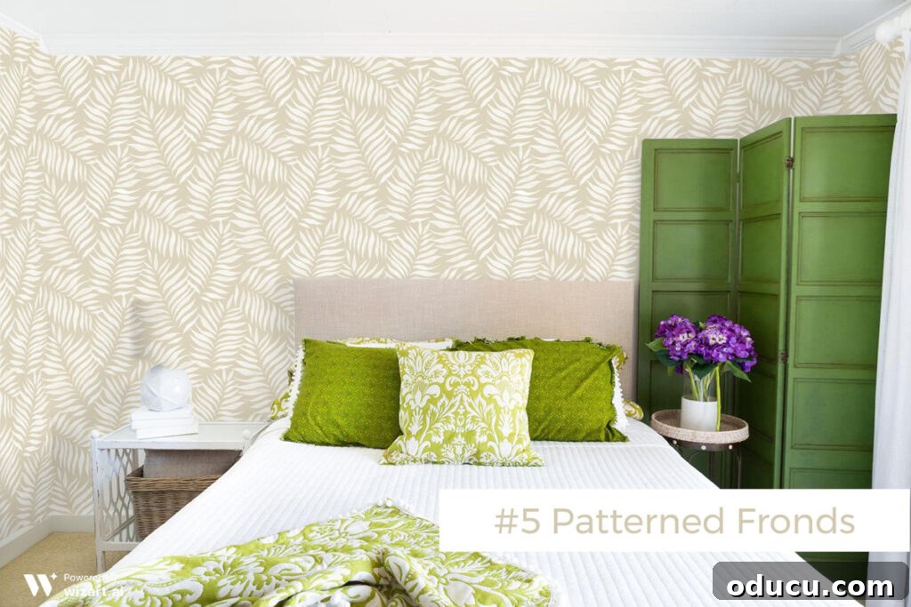 Chic Comfort for Guest Room One 13 #5 Patterned Fronds wallpaper sample on wall. A decorative Patterned Fronds wallpaper sample in Wheat color, on a wall for design assessment.