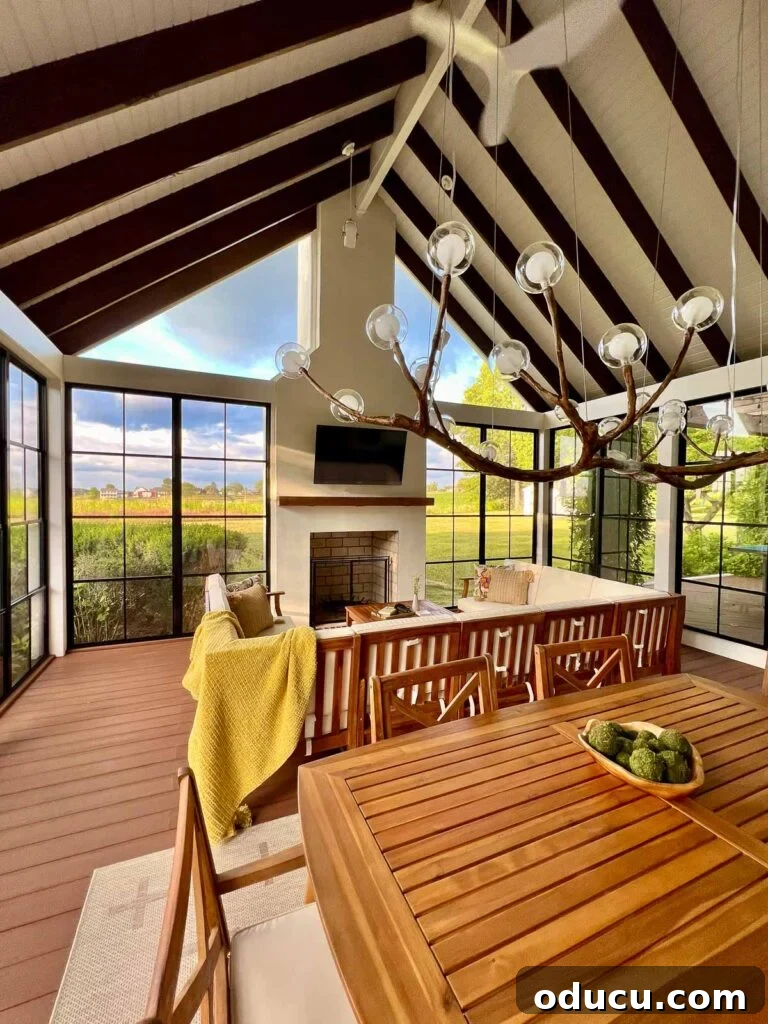 Style Expedition 2 Stunning screen porch reveal from The Heathered Nest, a perfect example of blending indoor comfort with outdoor charm for year-round enjoyment.