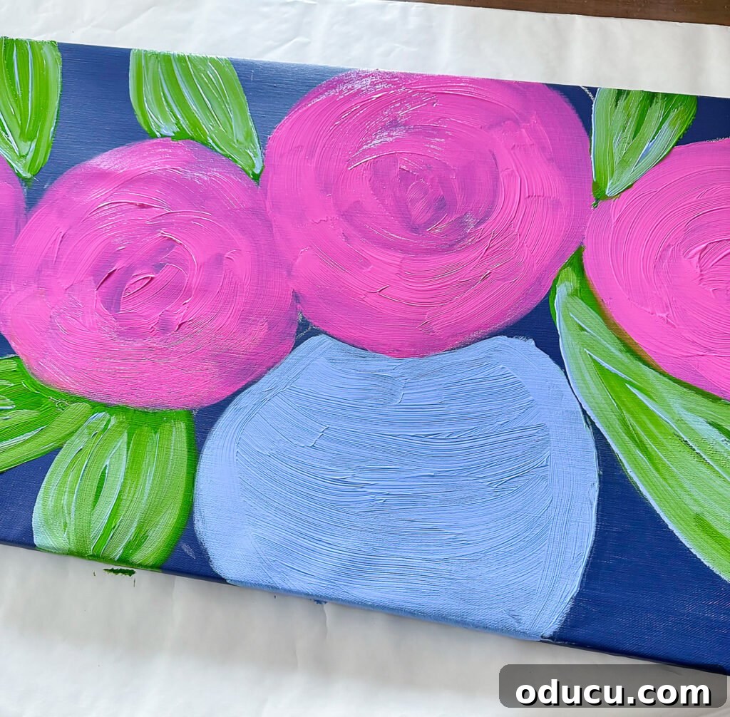 Paint Your Own Canvas: Simple Art for Everyone 10 Step 2: Base color of a vase pink flowers and leaves on a art canvas showing the brush strokes.