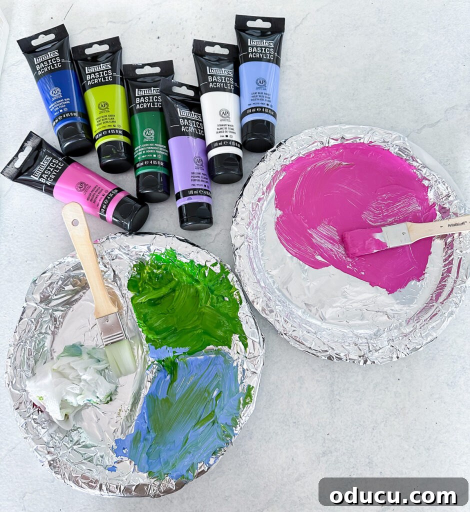 Paint Your Own Canvas: Simple Art for Everyone 9 Two DIY acrylic paint palettes made using foil and paper plates.