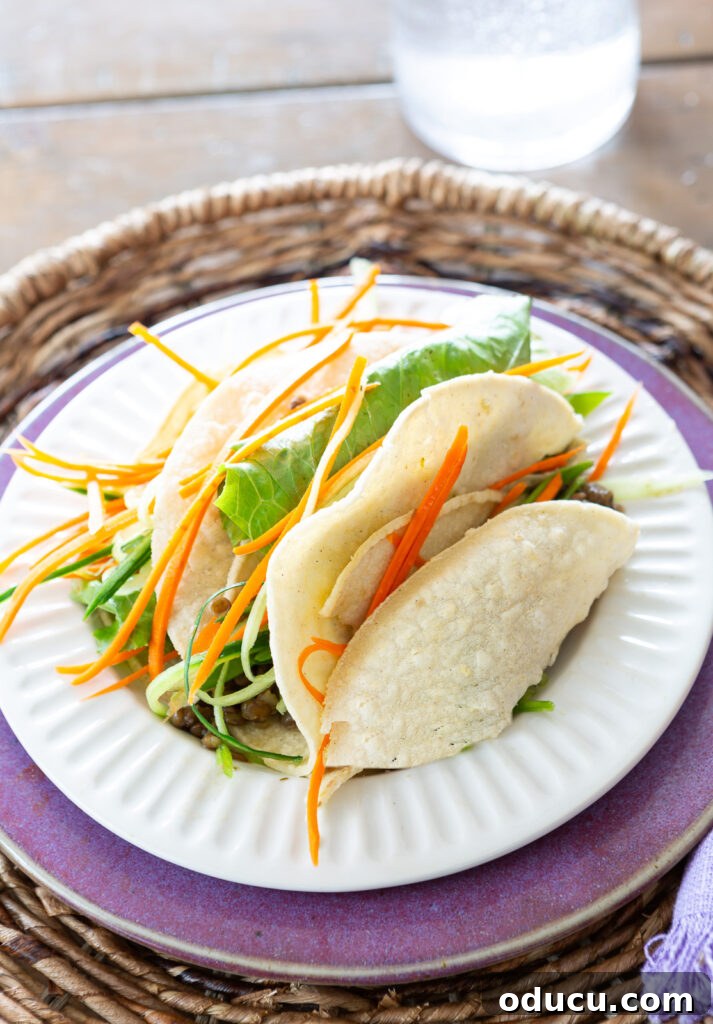 Hold Off on Fall Decorating Try This Alternative 16 white ridged dessert plate from McGee & Co on top of a purple plate from a thrift store. Filled with veggie tacos.