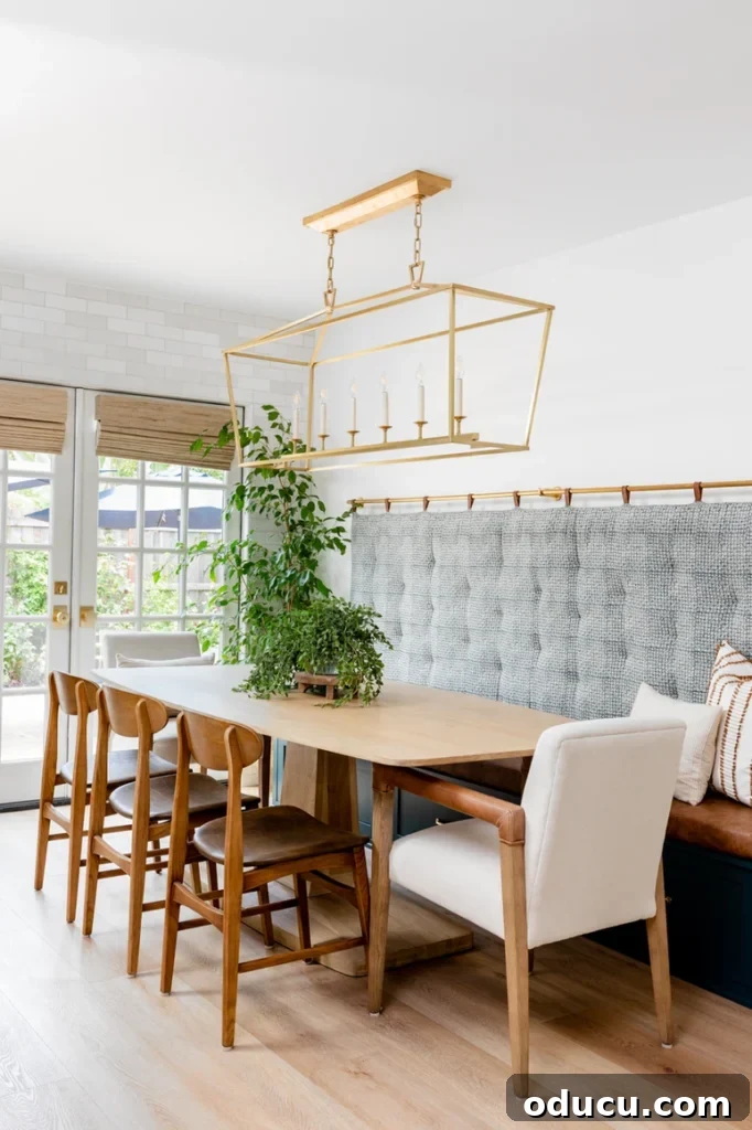 Style Dossier: Entry 209 2 A beautifully designed modern kitchen by Madison Nicole Design, featuring natural wood accents and warm lighting, perfect for inspiring fall coziness.