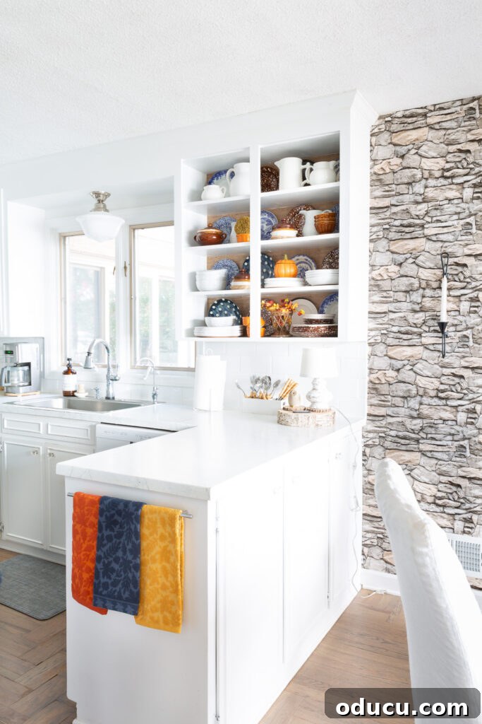 Fall Kitchen Shelves Get a Wallpaper Makeover 17 View of completed color and style changes of open kitchen shelves for fall.
