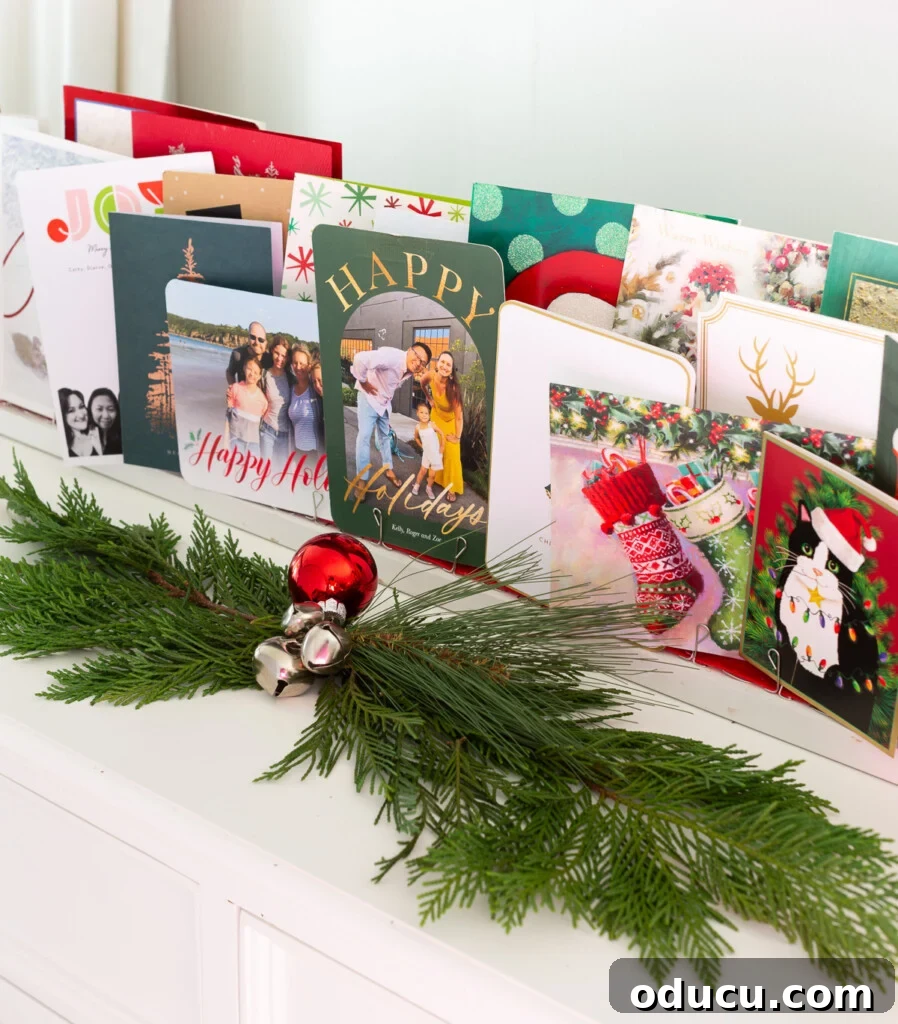 Tealight Village Magic: Fall and Holiday Decor 4 A unique Christmas card holder crafted from repurposed scrap wood, perfect for displaying festive cards on a mantel or console table.