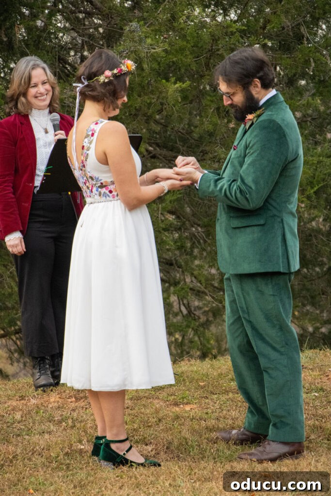 Mandy Ties the Knot 10 wedding-ceremony-exchanging-rings