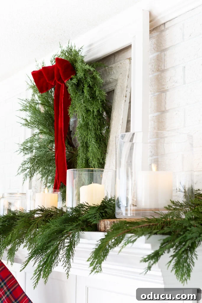 Decking the Halls for the Holidays 2 White Christmas mantel decorated for Christmas using a classic red and green holiday color scheme.