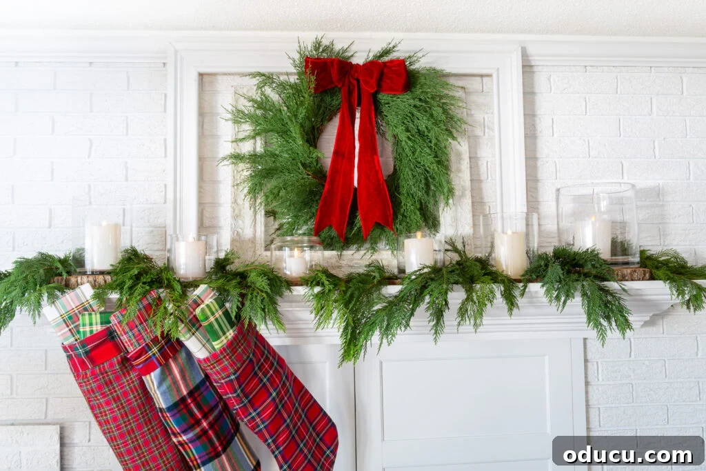 Decking the Halls for the Holidays 4 White fireplace mantel decorated for Christmas in a red, green and plaid color scheme.