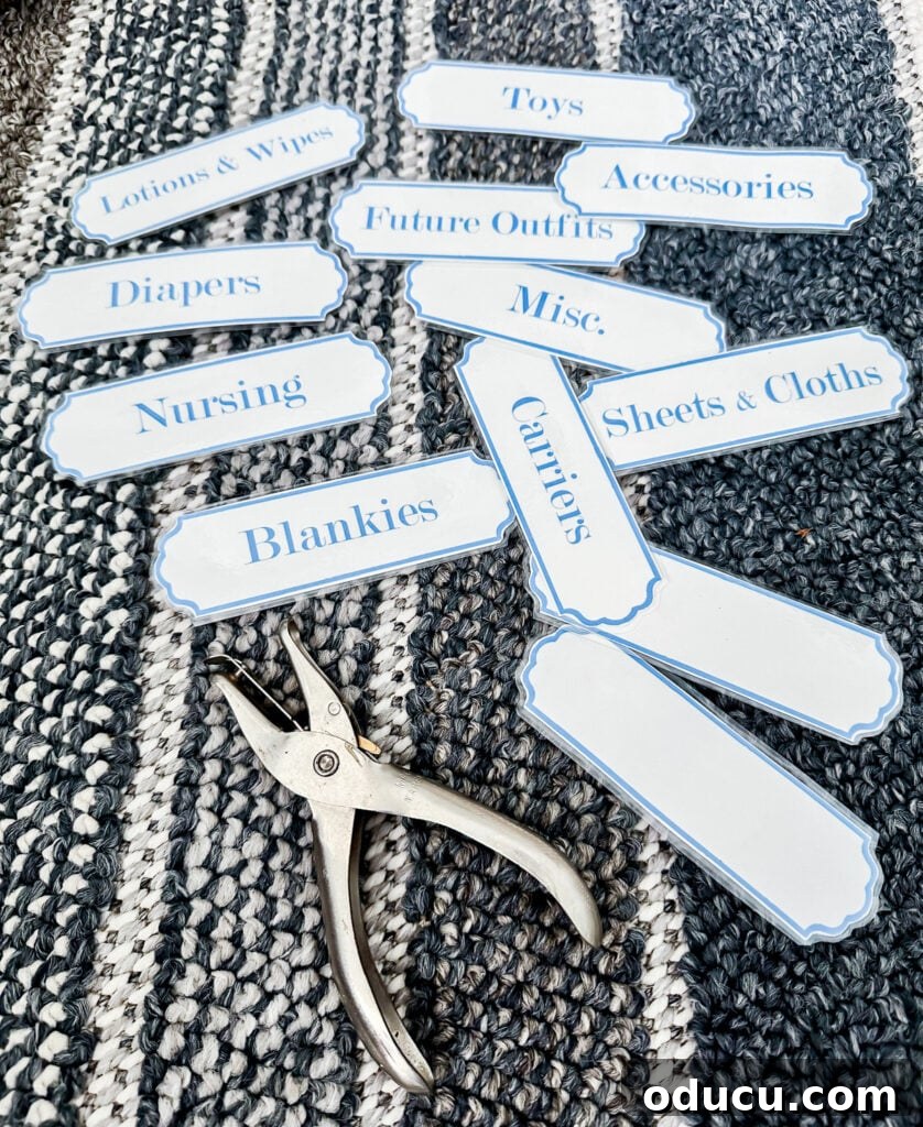 Elevate Your Nursery: Printable Basket Labels for Stylish Organization 4 Printable blue and white nursery labels for storage baskets, ready for organization