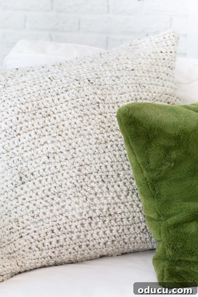 My Analog Carry: Intentional Essentials for an Offline Life 6 Close up the crocheted pillow cover on sofa.