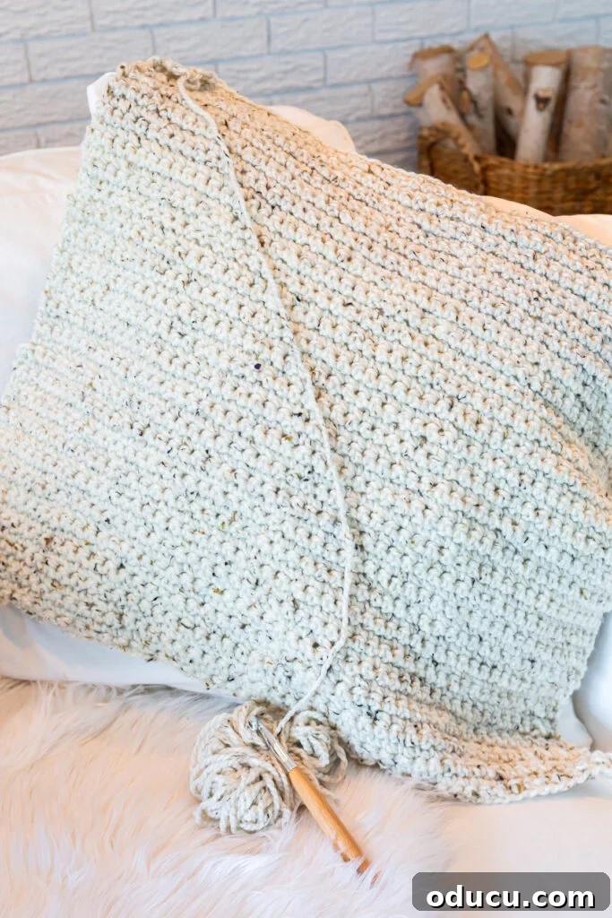 My Analog Carry: Intentional Essentials for an Offline Life 9 Fitting a crochet piece to the front of a throw pillow.