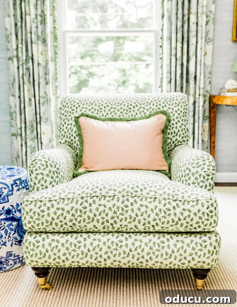Style Discoveries Issue 280 2 A serene living space featuring a spring green and white upholstered armchair, hinting at fresh seasonal decor.