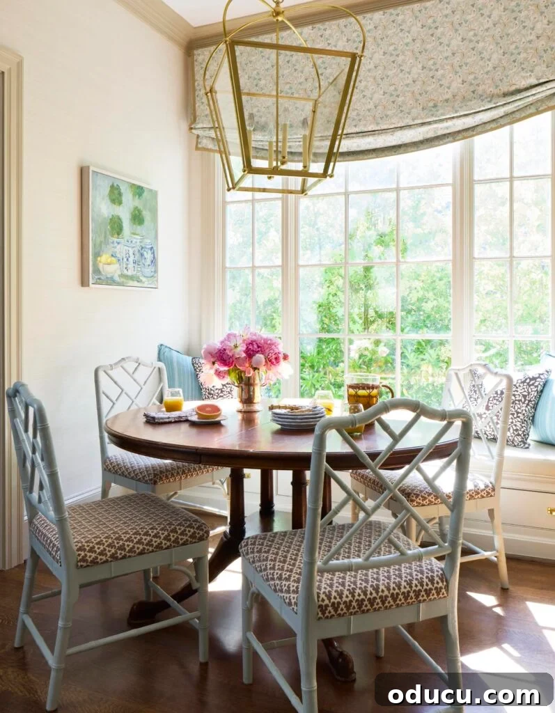 Beautifully designed dining area in a kitchen by Ashley Hanley, featuring elegant decor and a cozy ambiance, perfect for inspiring home styling.