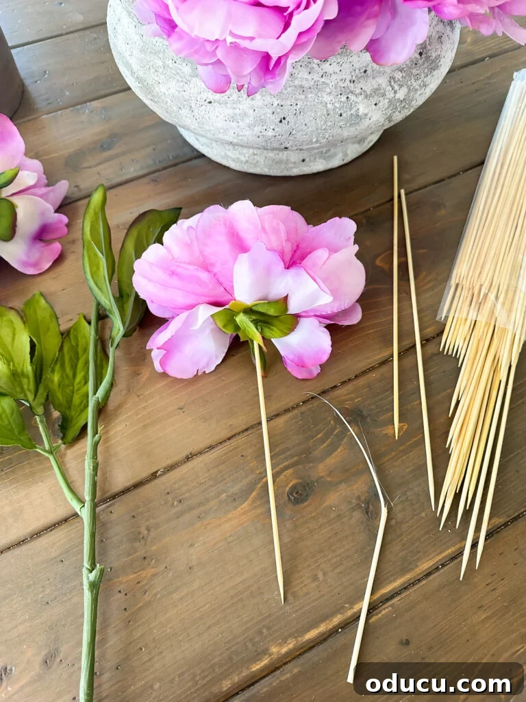 how to remove a faux flower head from a stem and then style it a different way.