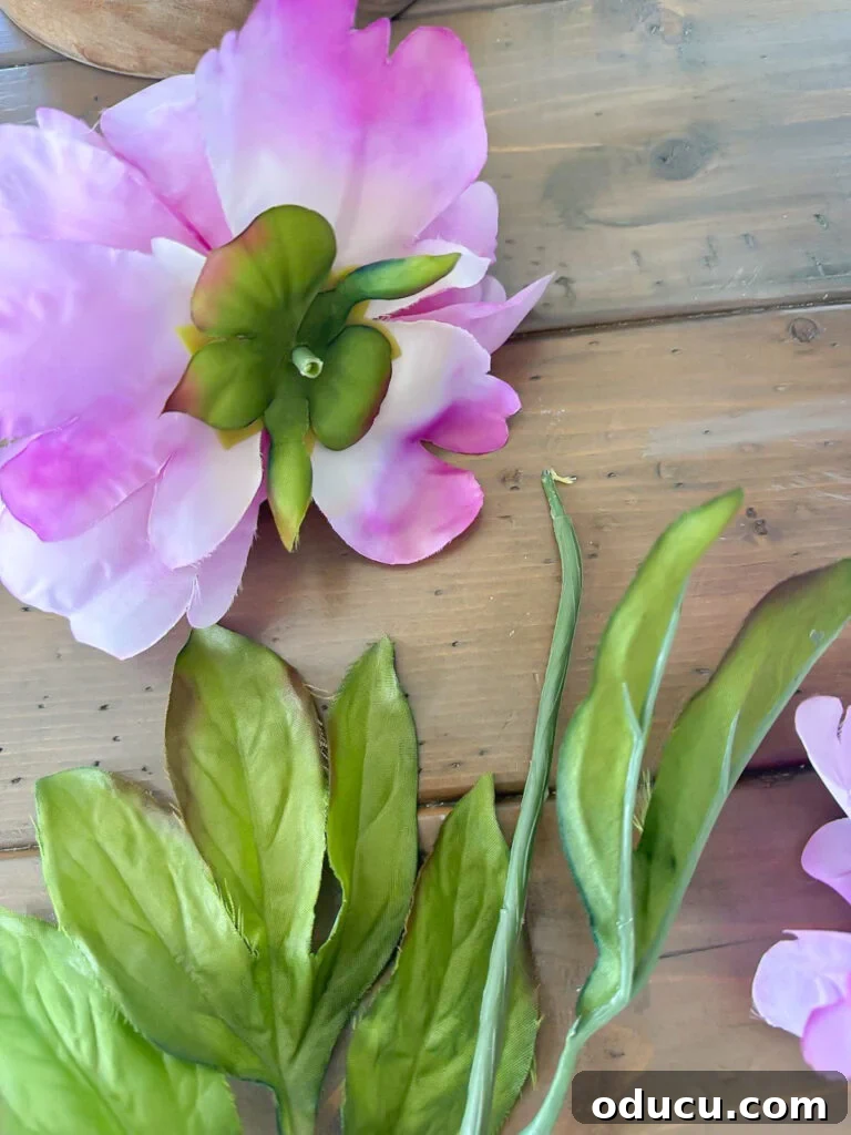 close up of pulled off a faux flower head from the stem