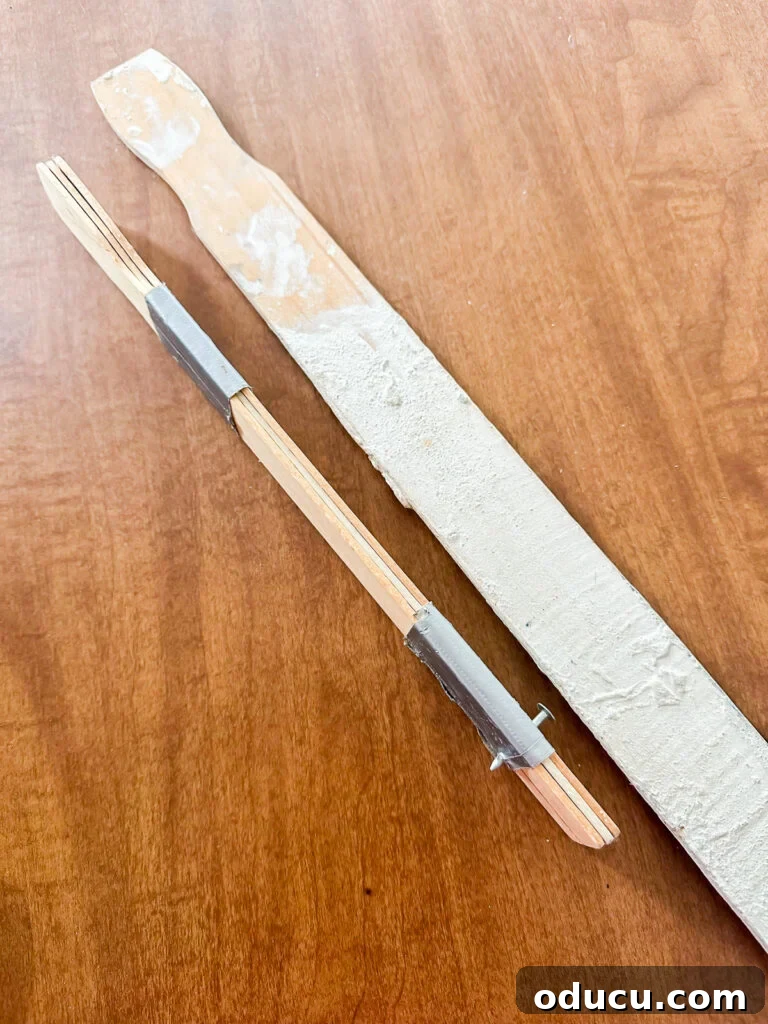 DIY wall art hangers that make hanging art easy and precise.