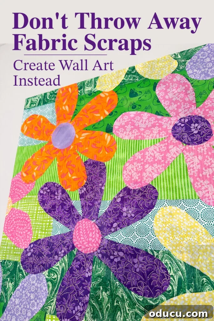 Don't throw away fabric scraps - create wall art instead. Colorful flower canvas made using fabric scraps and quilt squares.